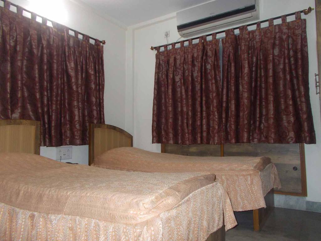 Fabexpress Harry Inn Калькутта Номер фото